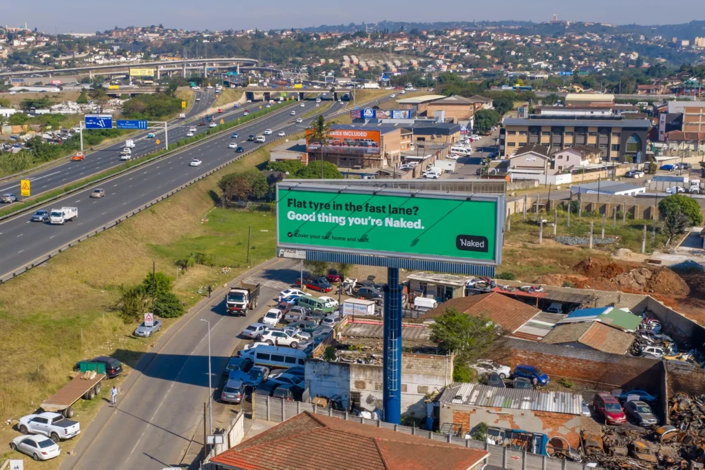 Face First Media blog header image showing an outdoor advertising billboard